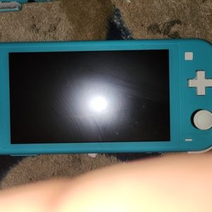 2 Nintendo switch, 1 has a cracked screen but still works and 2 works fine